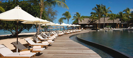 _~_media_Outrigger-Images_Property_outrigger-mauritius-resort-and-spa_hero-714x314_outrigger-mauritius-resortand-spa-pool-umbrellas-side-714X314.jpg